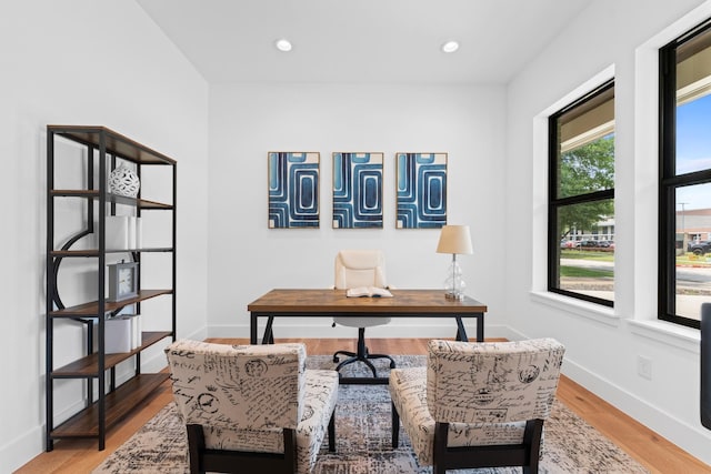 office with recessed lighting, baseboards, and light wood-type flooring