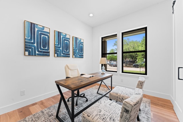office area featuring baseboards, recessed lighting, and light wood-style flooring
