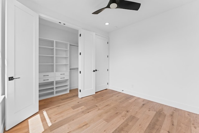 unfurnished bedroom with a ceiling fan, baseboards, a closet, light wood-style floors, and recessed lighting