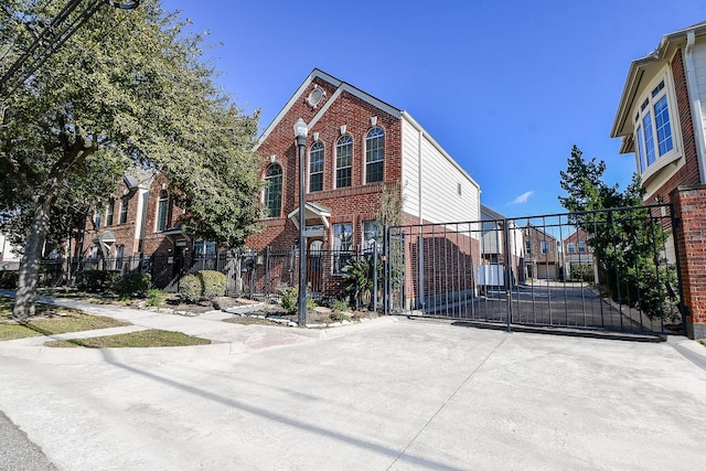1708 Aden Mist Dr, Houston, TX 77003 - view of front of house with brick siding, a gate, and fence