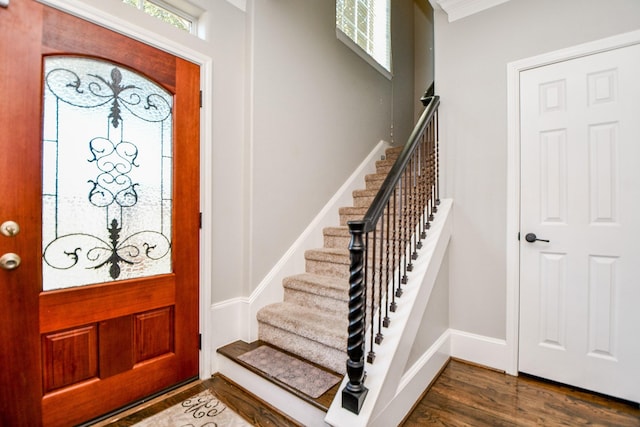 1708 Aden Mist Dr, Houston, TX 77003 - entryway featuring stairway, dark wood-style flooring, and baseboards