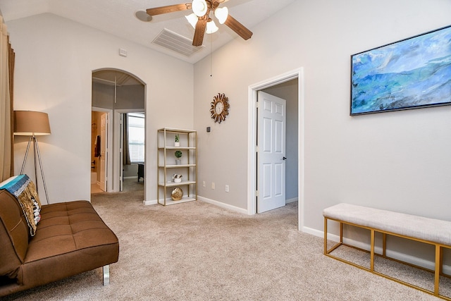 1708 Aden Mist Dr, Houston, TX 77003 - living area with lofted ceiling, a ceiling fan, arched walkways, carpet floors, and baseboards