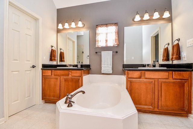 1708 Aden Mist Dr, Houston, TX 77003 - bathroom featuring tile patterned floors, a garden tub, a shower stall, and two vanities