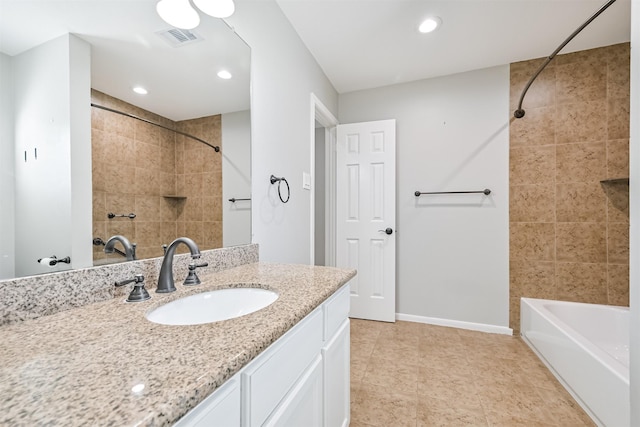3430 Williams Glen Dr, Sugar Land, TX 77479 - bathroom with baseboards, bathtub / shower combination, vanity, and recessed lighting