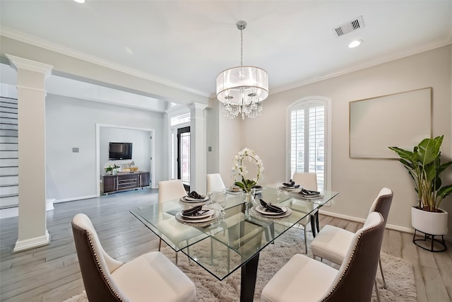 3430 Williams Glen Dr, Sugar Land, TX 77479 - dining area with decorative columns, ornamental molding, light wood-style flooring, baseboards, and recessed lighting