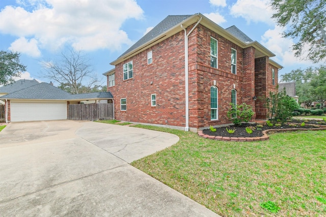3430 Williams Glen Dr, Sugar Land, TX 77479 - view of side of home with brick siding, driveway, a garage, and roof with shingles