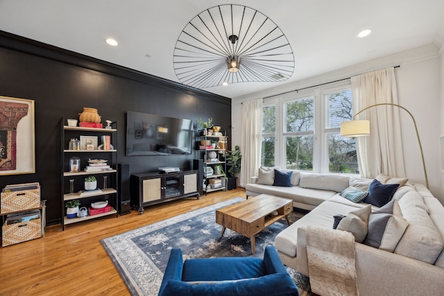 711 Temple St, Houston, TX 77009 - living room with ornamental molding, wood finished floors, and recessed lighting