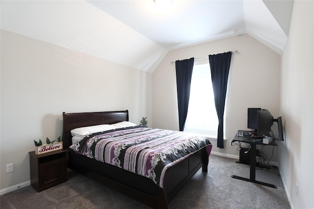 bedroom with baseboards, carpet flooring, and lofted ceiling