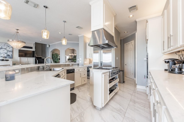 kitchen featuring visible vents, ornamental molding, and a sink