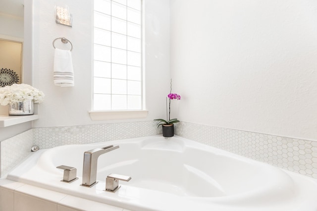 full bathroom featuring a bath