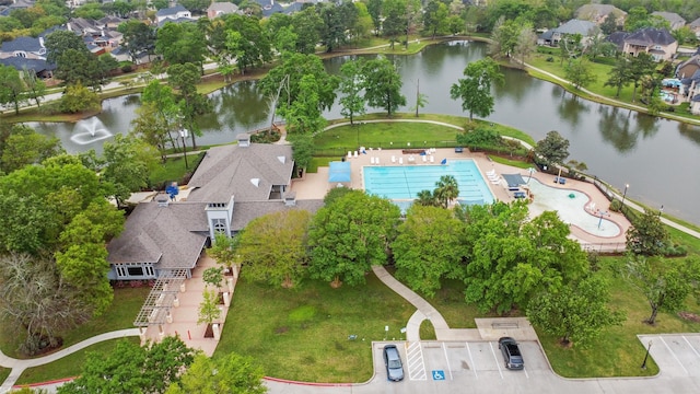 birds eye view of property with a residential view and a water view