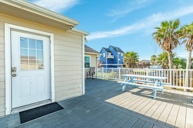 4006 Reeves Dr, Galveston, TX 77554 - wooden terrace with a residential view