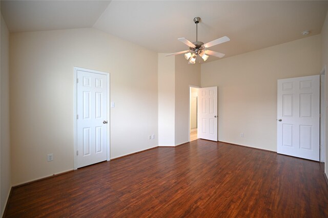 interior space featuring dark wood-type flooring, a ceiling fan, and lofted ceiling