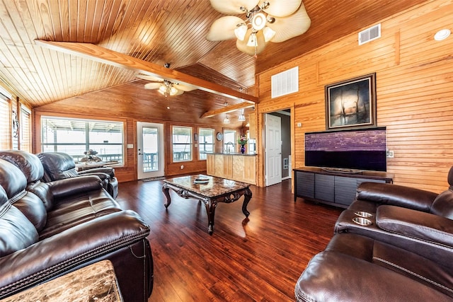 1102 15th St, San Leon, TX 77539 - living room featuring visible vents, wooden ceiling, a ceiling fan, and wooden walls