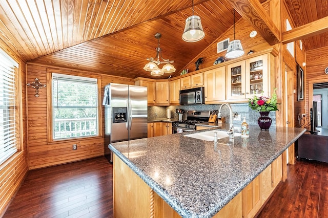 1102 15th St, San Leon, TX 77539 - kitchen featuring wood ceiling, lofted ceiling, a sink, appliances with stainless steel finishes, and dark wood-style floors