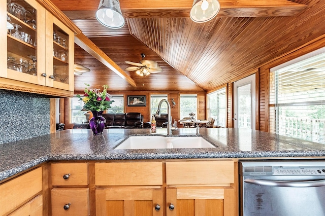 1102 15th St, San Leon, TX 77539 - kitchen with wooden ceiling, stainless steel dishwasher, glass insert cabinets, a sink, and open floor plan