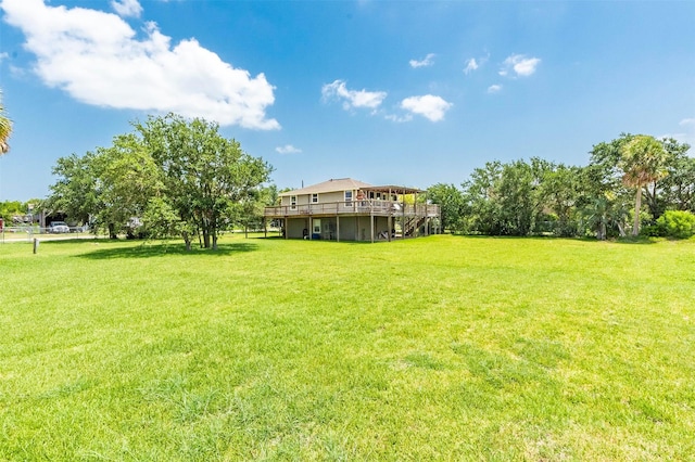 1102 15th St, San Leon, TX 77539 - view of yard with a wooden deck