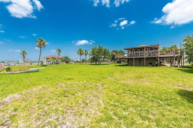 1102 15th St, San Leon, TX 77539 - view of yard with a deck and stairway
