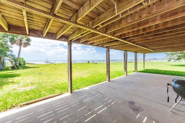 1102 15th St, San Leon, TX 77539 - view of patio featuring a water view and fence
