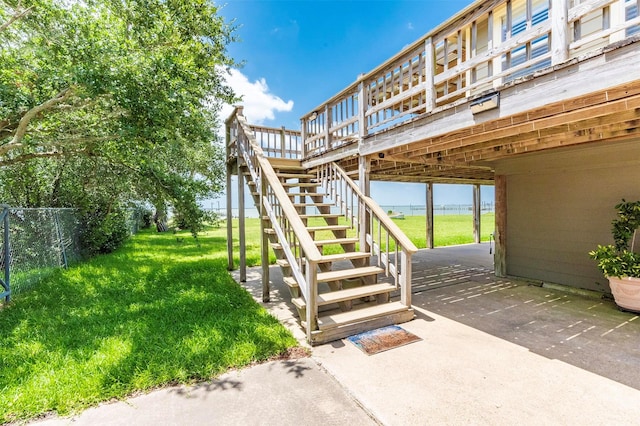 1102 15th St, San Leon, TX 77539 - view of patio featuring a wooden deck, stairs, and fence