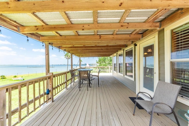 1102 15th St, San Leon, TX 77539 - deck with a water view and outdoor dining area
