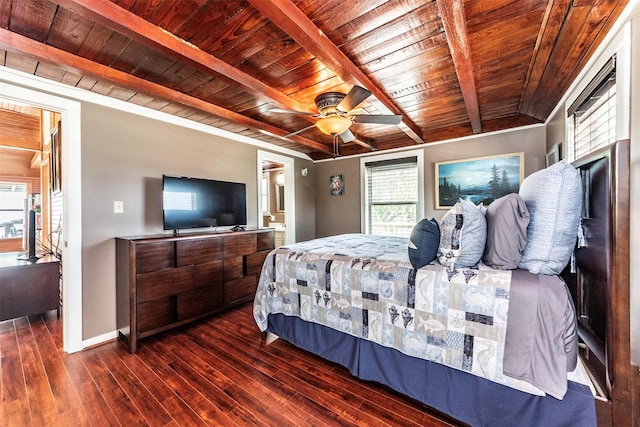 1102 15th St, San Leon, TX 77539 - bedroom featuring beam ceiling, baseboards, wood-type flooring, and wooden ceiling