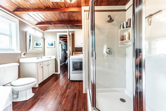 1102 15th St, San Leon, TX 77539 - bathroom featuring a stall shower, wood ceiling, wood finished floors, and washer / clothes dryer