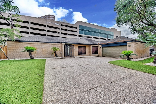 15626 Whitewater Ln, Houston, TX 77079 - view of front facade featuring brick siding, a garage, a front lawn, and concrete driveway