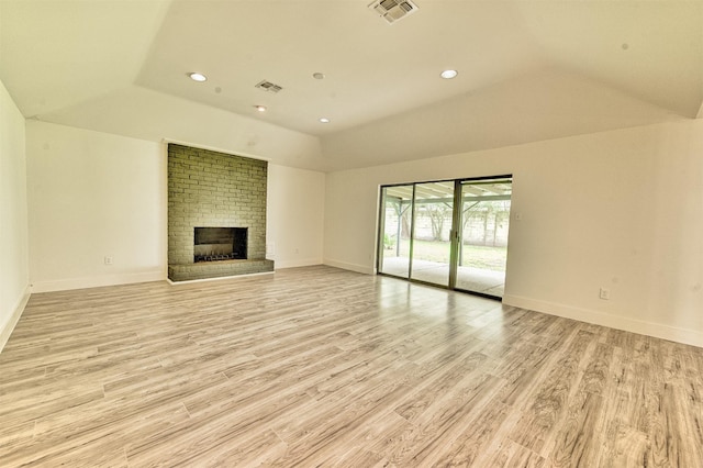 15626 Whitewater Ln, Houston, TX 77079 - unfurnished living room with light wood-style floors, baseboards, a tray ceiling, and visible vents