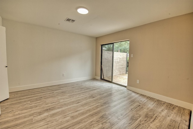15626 Whitewater Ln, Houston, TX 77079 - empty room featuring baseboards, light wood-type flooring, and visible vents