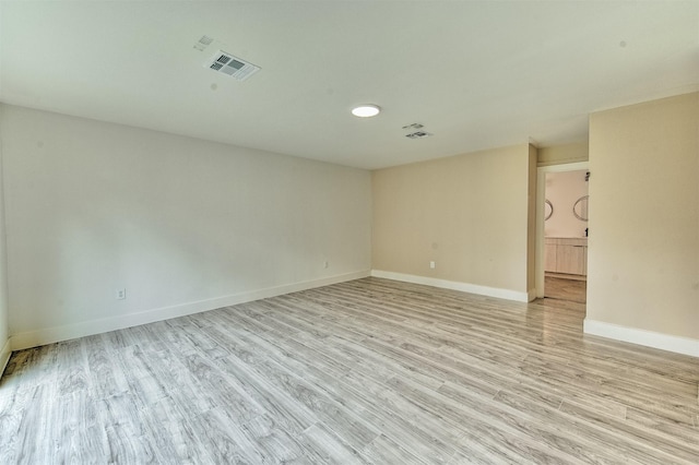 15626 Whitewater Ln, Houston, TX 77079 - unfurnished room with visible vents, baseboards, and light wood-type flooring