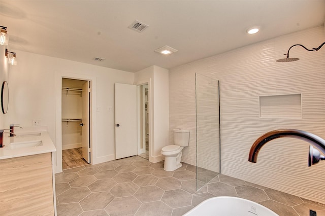15626 Whitewater Ln, Houston, TX 77079 - bathroom featuring walk in shower, visible vents, a sink, and recessed lighting