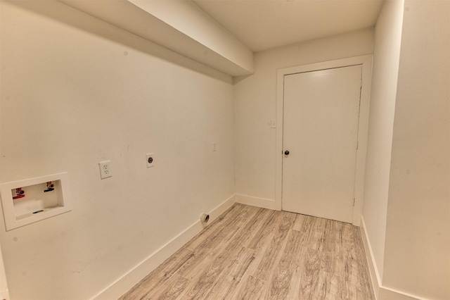 15626 Whitewater Ln, Houston, TX 77079 - laundry room featuring laundry area, baseboards, hookup for a washing machine, light wood-type flooring, and electric dryer hookup