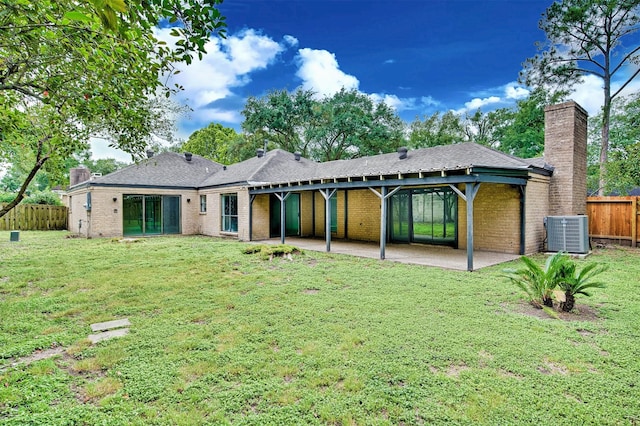 15626 Whitewater Ln, Houston, TX 77079 - rear view of property with a patio, central air condition unit, a chimney, and fence