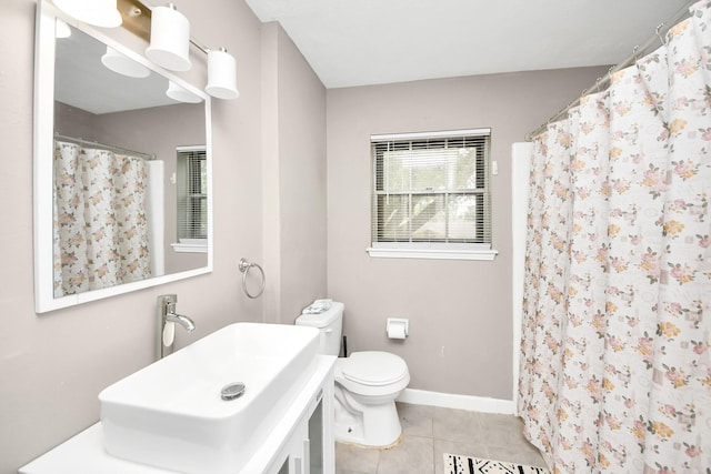 full bathroom with tile patterned floors, a shower with shower curtain, toilet, vanity, and baseboards