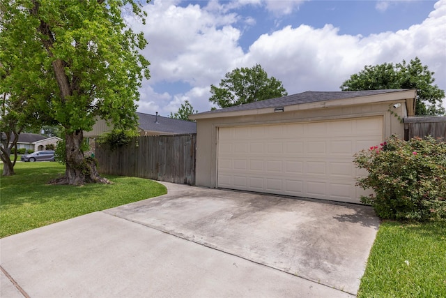 garage with fence