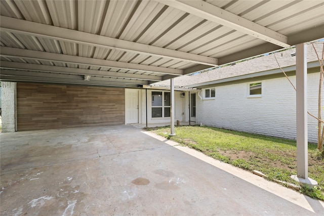 view of patio / terrace with an attached carport