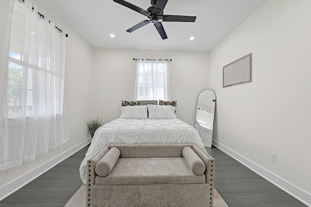 bedroom with dark wood-type flooring, recessed lighting, baseboards, and ceiling fan