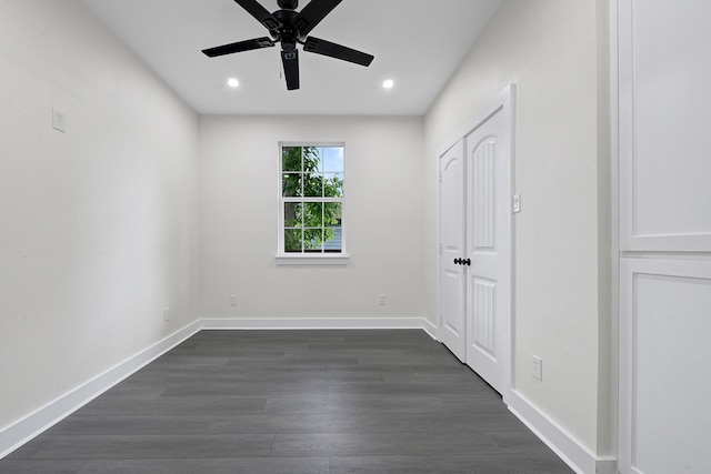 unfurnished bedroom featuring ceiling fan, recessed lighting, baseboards, dark wood-style floors, and a closet