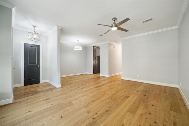 3708 Lake St, Houston, TX 77098 - unfurnished room with light wood finished floors, visible vents, ornamental molding, and ceiling fan with notable chandelier