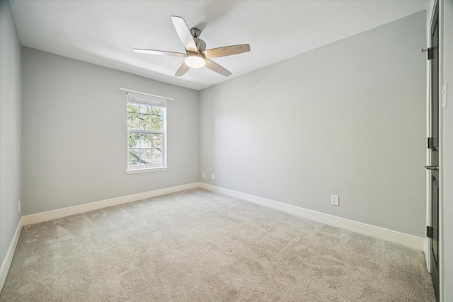 3708 Lake St, Houston, TX 77098 - empty room with baseboards, a ceiling fan, and light colored carpet