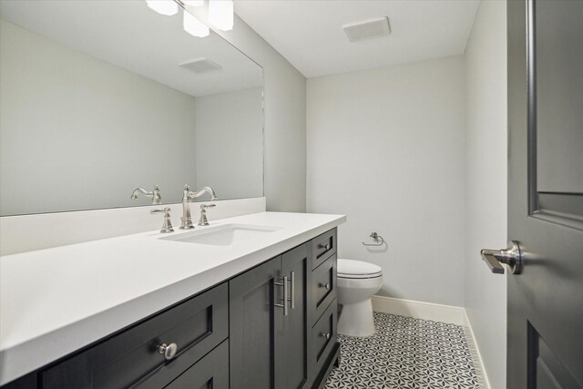 3708 Lake St, Houston, TX 77098 - bathroom featuring vanity, toilet, and baseboards