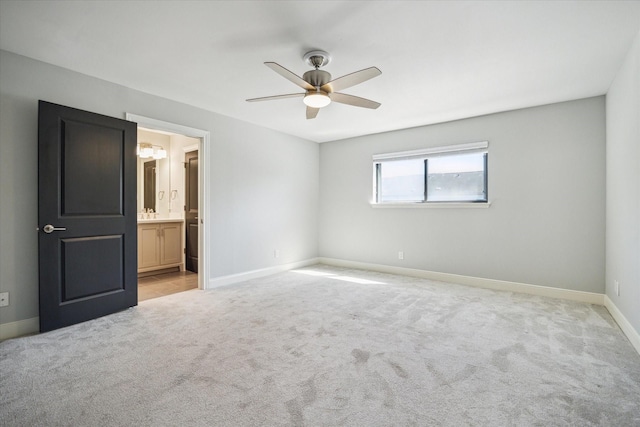 3708 Lake St, Houston, TX 77098 - unfurnished bedroom with baseboards, ensuite bathroom, ceiling fan, and light colored carpet