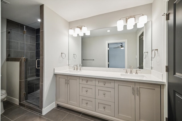 3708 Lake St, Houston, TX 77098 - full bathroom with tile patterned floors, ceiling fan, toilet, and a sink