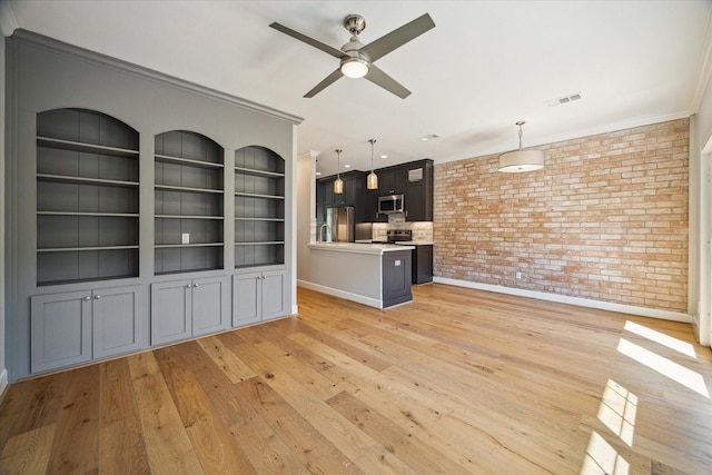 3708 Lake St, Houston, TX 77098 - unfurnished living room with brick wall, ornamental molding, ceiling fan, baseboards, and light wood-type flooring