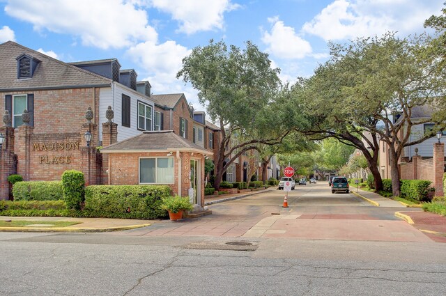 3708 Lake St, Houston, TX 77098 - view of street featuring curbs, sidewalks, a residential view, and traffic signs