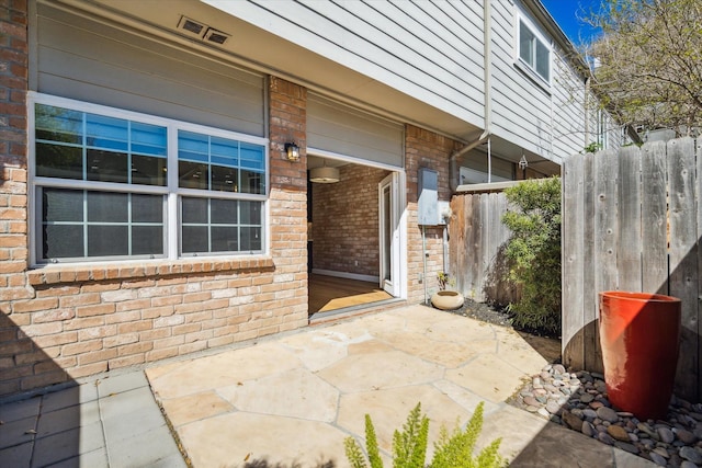 3708 Lake St, Houston, TX 77098 - doorway to property with brick siding and fence