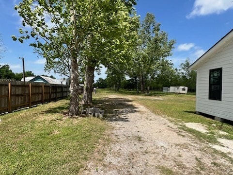 view of yard featuring fence