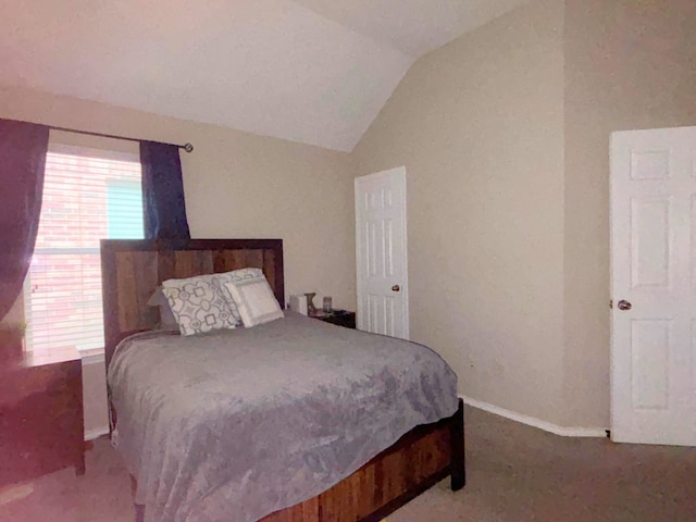 4326 Sunlit Pass Loop, Humble, TX 77396 - bedroom featuring baseboards, carpet, and vaulted ceiling