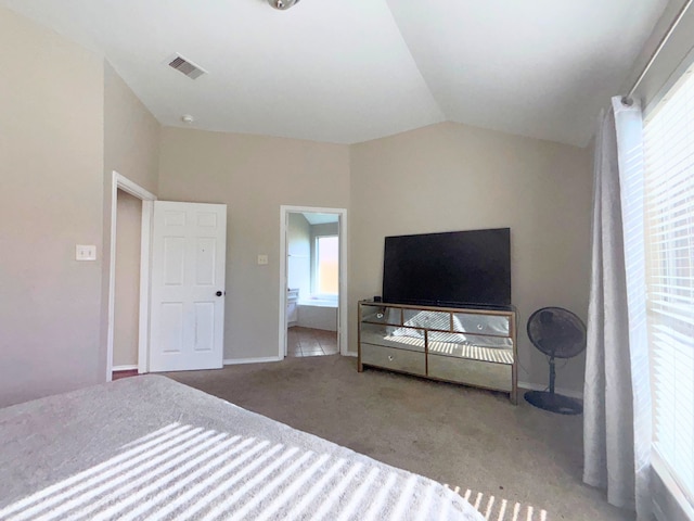 4326 Sunlit Pass Loop, Humble, TX 77396 - bedroom with vaulted ceiling, visible vents, multiple windows, and carpet floors